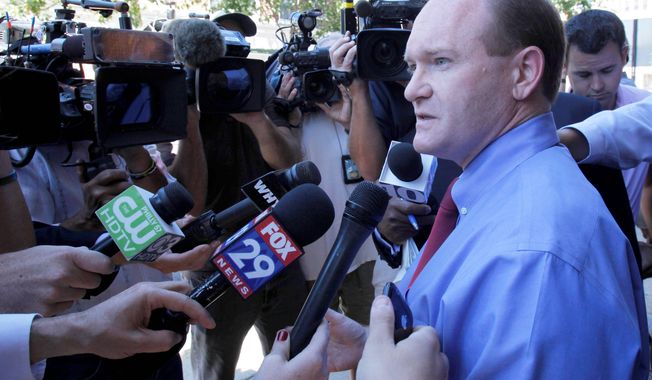 Delaware Democratic Senate candidate Chris Coons talks with reporters Wednesday in Wilmington. Mr. Coons will face long-shot, “tea party”-backed Republican nominee Christine O&#x27;Donnell in the November election.