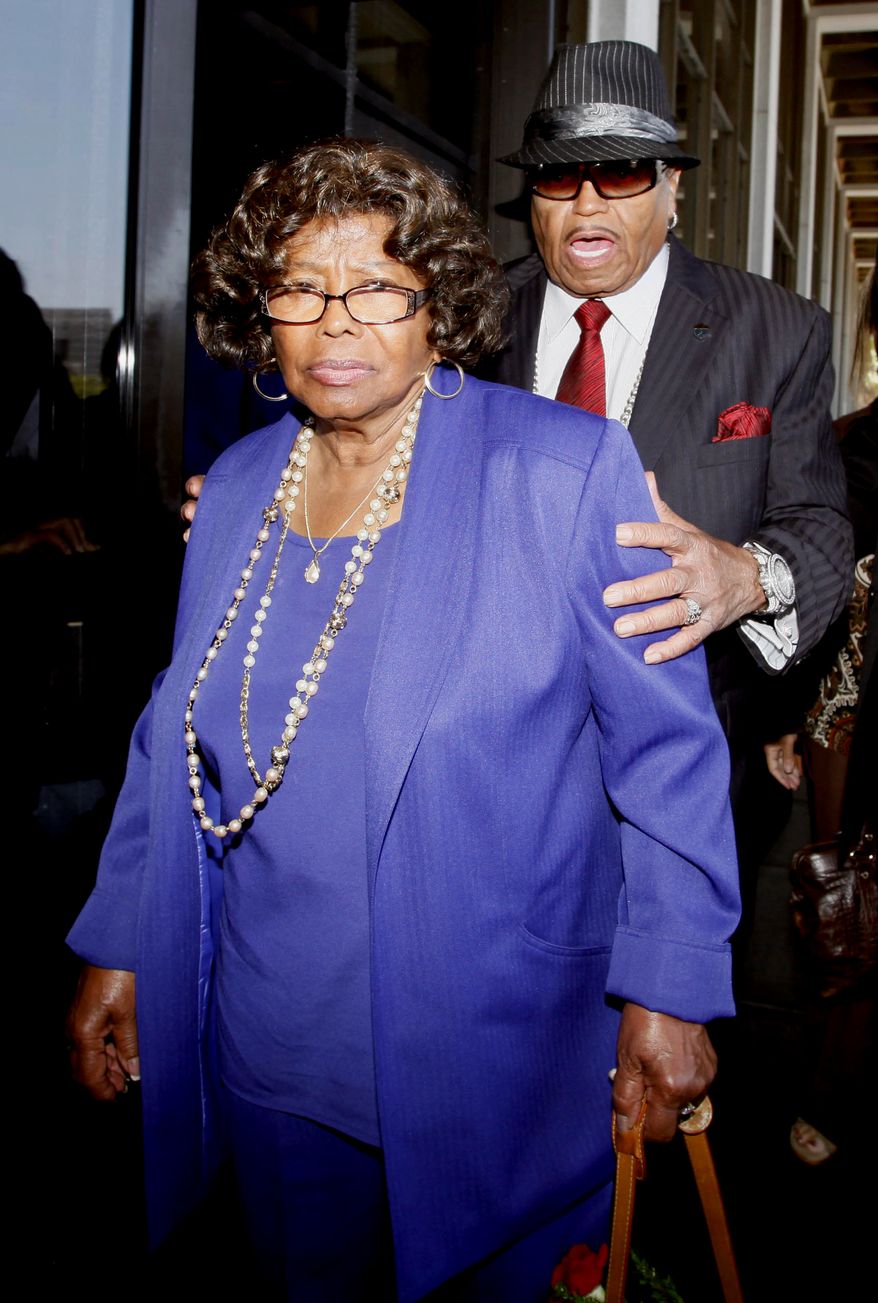 In this June 14, 2010, photo, Michael Jackson's parents, Katherine Jackson and Joe Jackson leave a Los Angeles courthouse after a preliminary hearing setting and motions in the trial of Michael Jackson's personal doctor Conrad Murray. Katherine Jackson has sued the promoter of what were intended to be the pop star's comeback concerts for fraud and other claims related to the singer's death on Wednesday, Sept. 15, 2010. (AP Photo/Nick Ut)