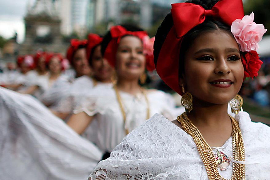 Dancers perform during the bicentennial parade in Mexico City, Wednesday Sept. 15, 2010. Mexico celebrates the 200th anniversary of its 1810 independence uprising. (AP Photo/Miguel Tovar)