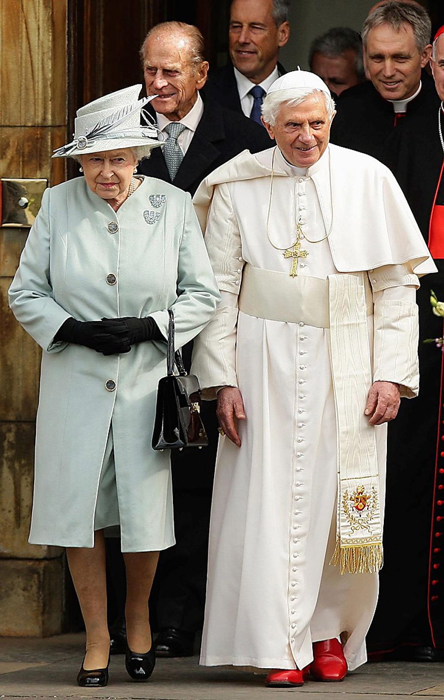 Britain's Queen Elizabeth II, left, walks with Pope Benedict XVI as they leave the Palace of Holyroodhouse in Edinburgh, Scotland, following his formal welcome on the first day of his four day visit to Britain, Thursday Sept. 16, 2010. Prince Philip following behind left and Pope's personal secretary Gerog Gaenswein, behind right. (AP Photo / Dave Thompson, pool)