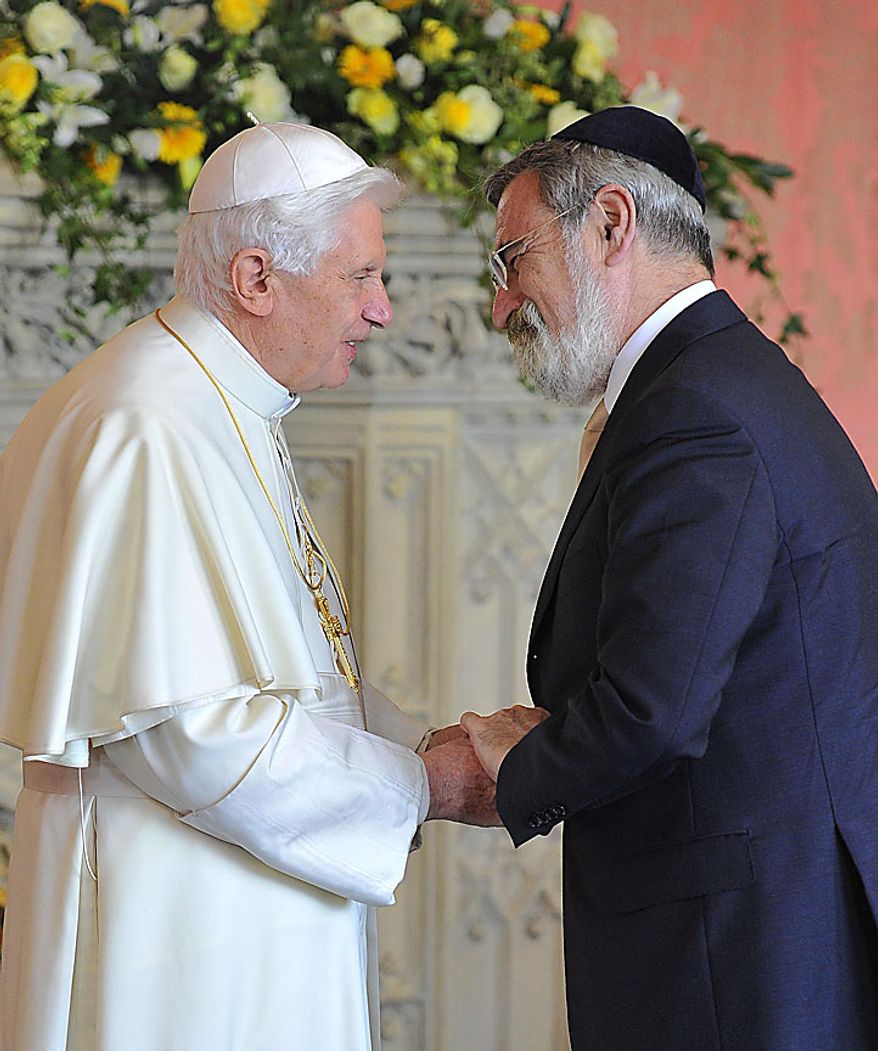 Pope Benedict XVI meets Britain's Chief Rabbi Jonathan Sacks, right, at a meeting of religious leaders at St Mary's University College Chapel at Twickenham in west London, Friday, Sept. 17, 2010. The Pope is on a four-day visit to England and Scotland. (AP Photo/Toby Melville, Pool)