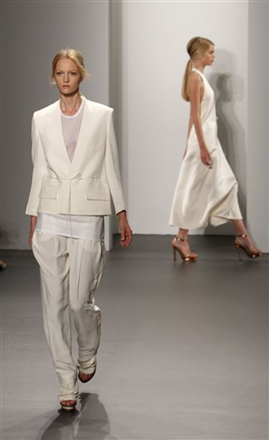The Calvin Klein spring 2011 collection is modeled during Fashion Week in New York, Thursday, Sept. 16, 2010. (AP Photo/Seth Wenig)