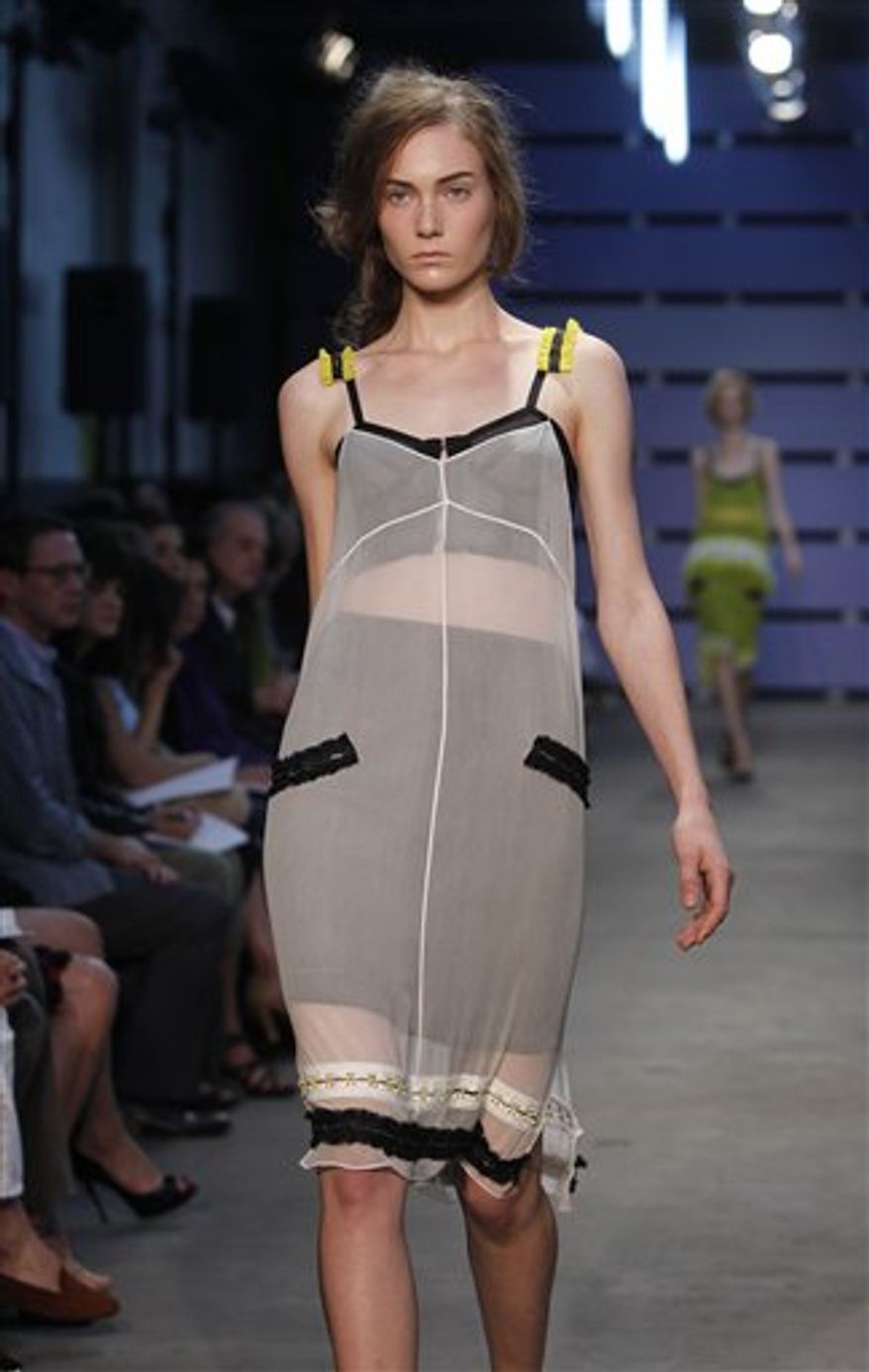 The Proenza Schouler spring 2011 collection is modeled during Fashion Week in New York, Wednesday, Sept. 15, 2010. (AP Photo/Seth Wenig)