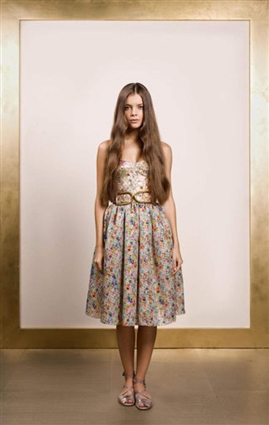 This Monday, Sept. 13, 2010 photo released by Carolyn Fong shows the Reem Acra spring 2011 collection modeled during Fashion Week in New York. (AP Photo/Carolyn Fong) NO SALES