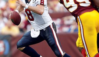 Houston Texans quarterback Matt Schaub scrambles during the second half an NFL football game against the Washington Redskins in Landover, Md., on Sunday, Sept. 19, 2010.  The Houston Texans won 30-27 in overtime. (AP Photo/Evan Vucci)