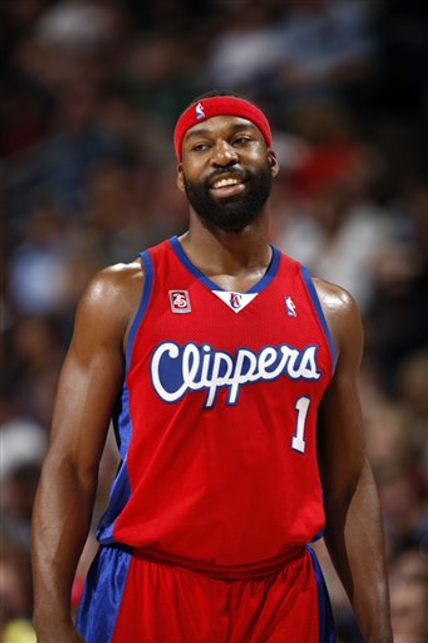 FILE - This March 14, 2009, file photo shows Los Angeles Clippers' Baron Davis smiling during a basketball game against the Denver Nuggets, in Denver. The nomination for Davis' documentary on L.A. gang life is just part of his plan to make a difference, on and off the court. (AP Photo/David Zalubowski, File)