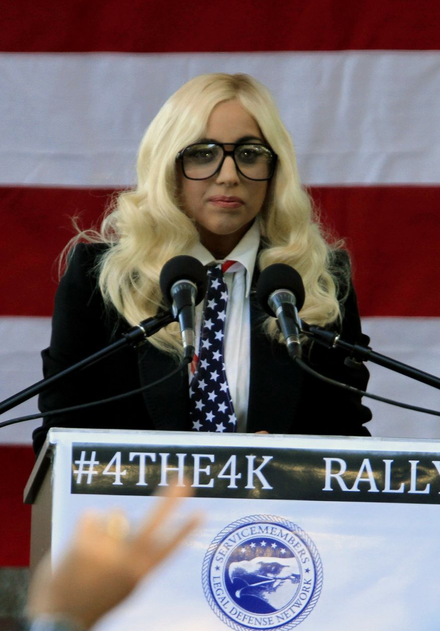Recording artist Lady Gaga speaks at a rally in support of repealing the military's "don't ask, don't tell" policy for gay service members, in Portland, Maine, on Monday, Sept. 20, 2010. (AP Photo/Pat Wellenbach)