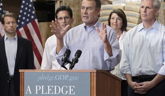 House Minority Leader John Boehner of Ohio, center, gestures while announcing the Republicans &quot;Pledge to America&quot; agenda, Thursday, Sept. 23, 2010, at a lumber company in Sterling, Va. From left are, Rep. Peter Roskam, R-Ill., House Minority Whip Eric Cantor of Va., Boehner, Rep. Cathy McMorris Rodgers, R-Wash., and Rep. Kevin McCarthy, R-Calif. (AP Photo/J. Scott Applewhite)