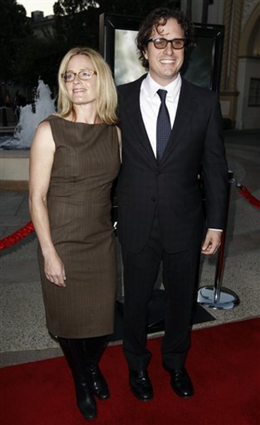 Director Davis Guggenheim, right, and Elisabeth Shue arrive at the premiere of "Waiting for 'Superman'" in Los Angeles, Monday, Sept. 20, 2010. (AP Photo/Matt Sayles)