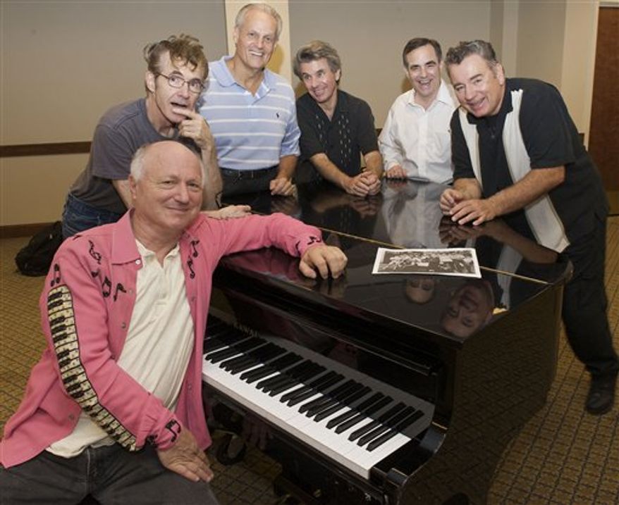 In this Sept. 24, 2010 photo, the Doo-Wop group Sha Na Na rehearses for their special performance to mark the 75th anniversary of Hofstra University in Melville, N.Y.,  From left are Screamin&#39; Scott Simon; Jocko Marcellino; Donny York; Robert Leonard; David Garrett and Elliot Cahn. (AP Photo/Kathleen Malone-Van Dyke)