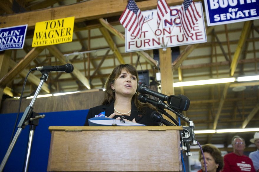 ** FILE ** Delaware Republican Senate candidate Christine O'Donnell speaks at a Sussex County Republican Committee picnic on Sunday, Sept. 19, 2010, in Lincoln, Del. (AP Photo/Jessica Kourkounis)