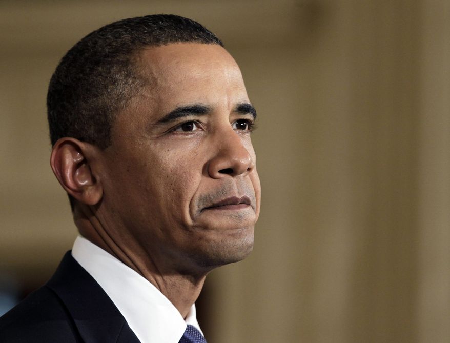 ** FILE ** President Obama (AP Photo/J. Scott Applewhite)