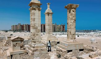 A five-star hotel in the Egyptian resort city of Marina is the backdrop for restored Roman pillar tombs from the Greco-Roman port city of Leukaspis on the Mediterranean coast. (Associated Press)