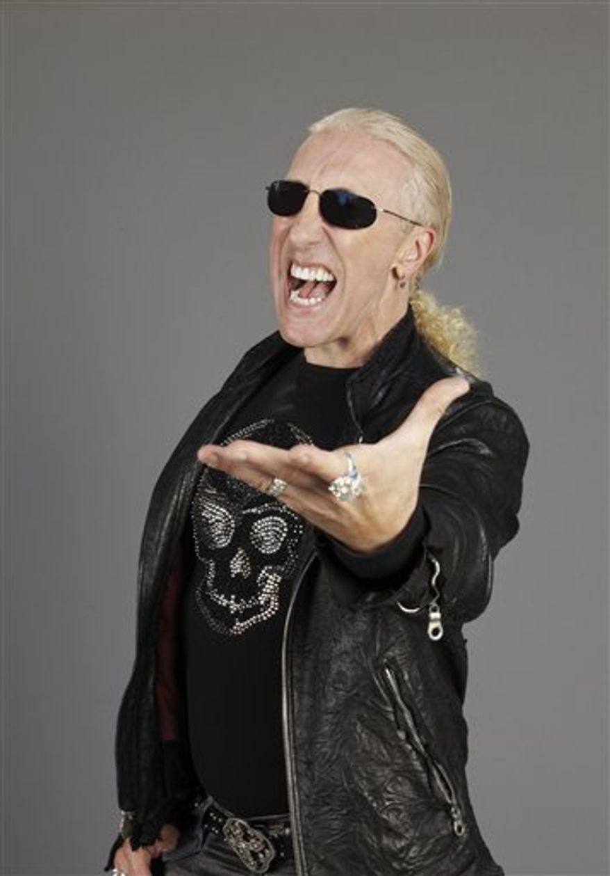 FILE - In this Jan. 24, 1986 file photo, Dee Snider of Twisted Sister performs at Radio City Music Hall in New York. (AP Photo/Corey Struller, file)