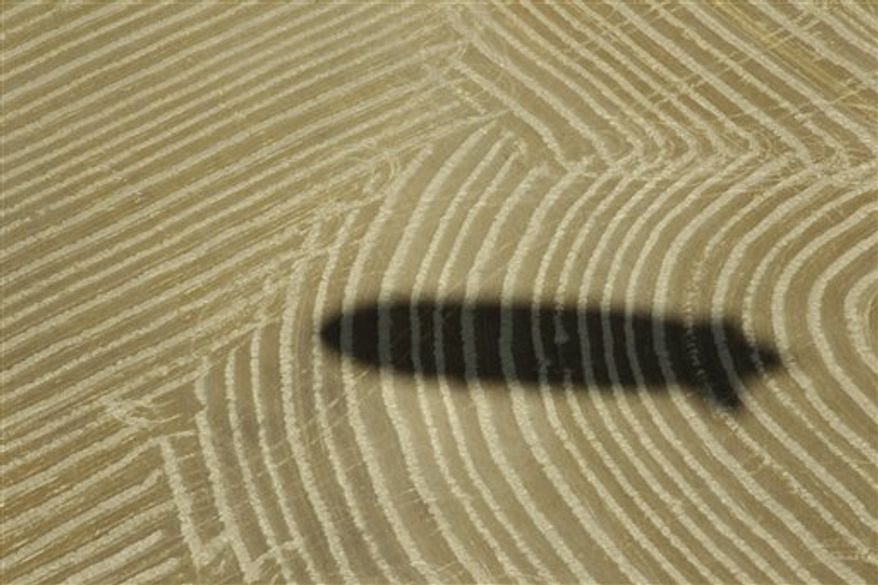 A killer whale is seen from the air aboard the Zeppelin airship "Eureka," near San Juan Island, Wash., Wednesday, Sept. 8, 2010. (AP Photo/Ted S. Warren)