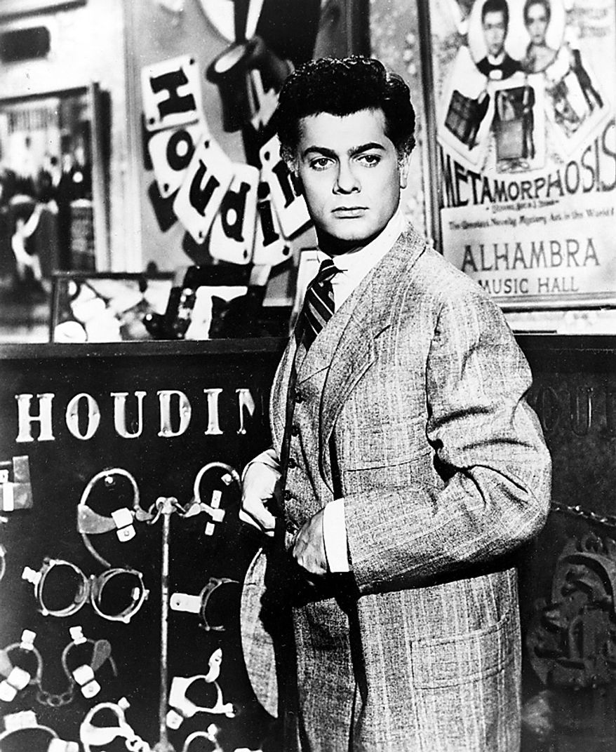 Actor Tony Curtis portrays magician Harry Houdini in the 1953 Hollywood movie "Houdini." Curtis has died at 85 according to the Clark County, Nev. coroner. (AP Photo, File)