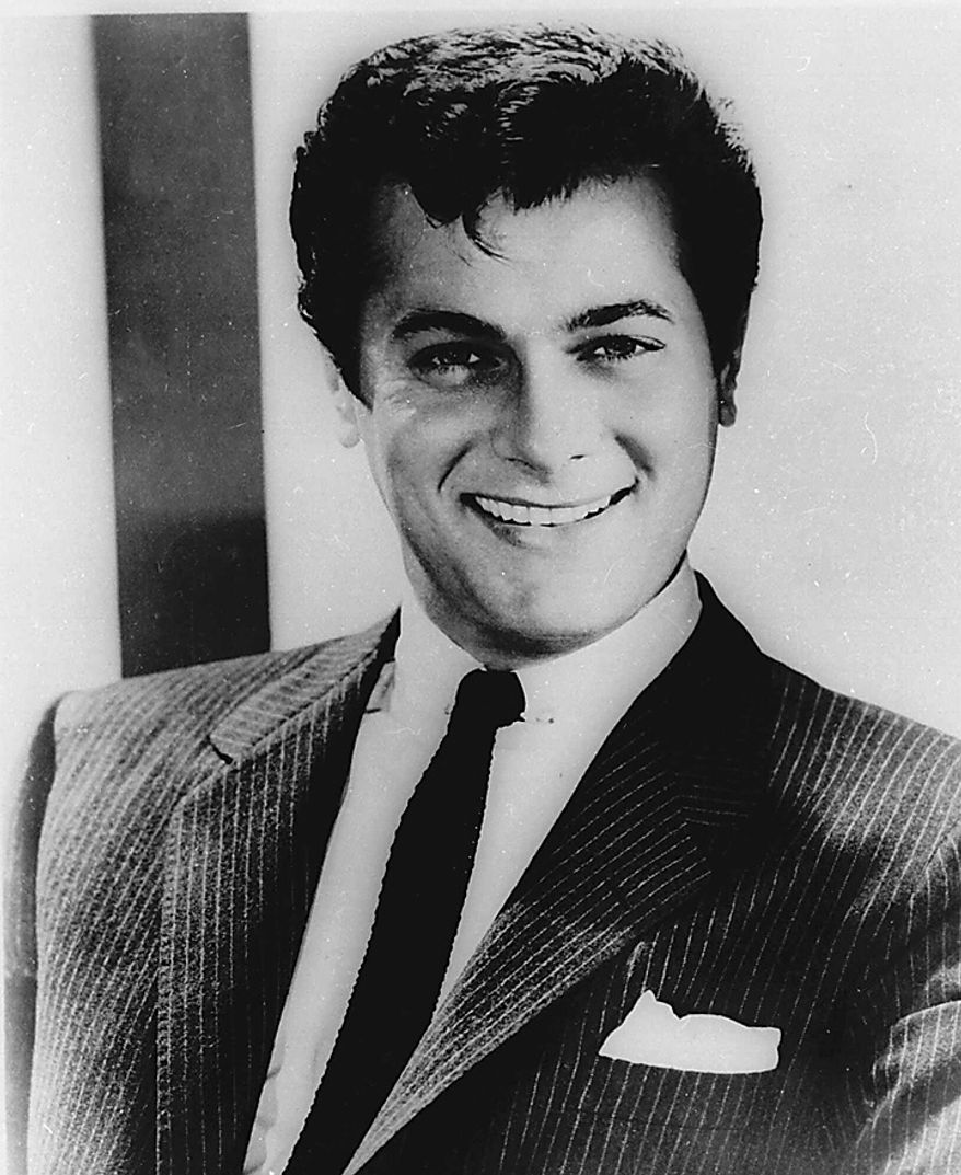 Tony Curtis poses in this April 1959 file photo. Curtis died Wednesday Sept. 29, 2010 at his Las Vegas area home of a cardiac arrest at 85 according to the Clark County, Nev. coroner. (AP Photo, File)