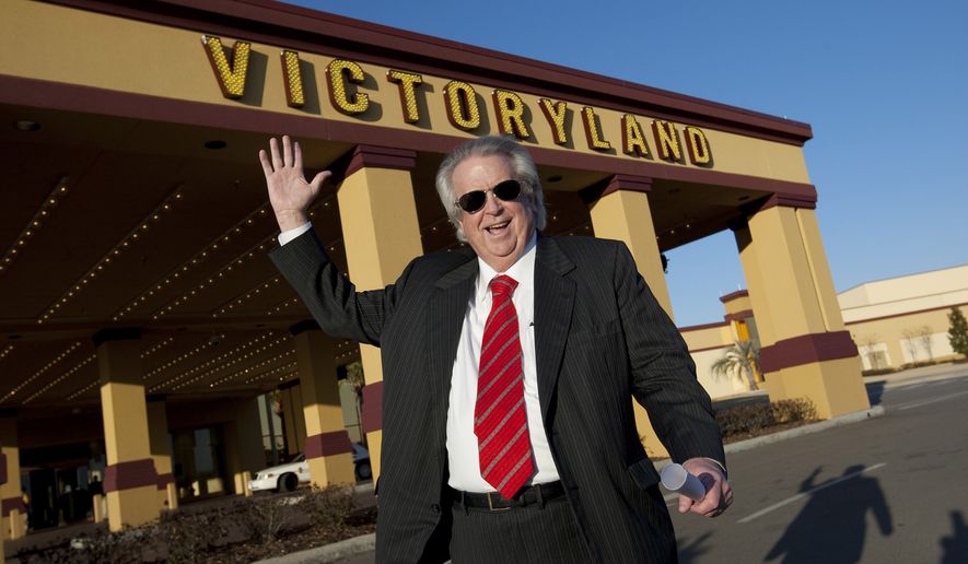 In a March 5, 2010, file photo, VictoryLand owner Milton McGregor is pictured at the casino in Shorter, Ala. McGregor, owner of Alabama&#39;s largest casino, along with four state senators and several top lobbyists have been indicted on federal charges accusing them of vote buying on a bill to legalize electronic bingo. The indictment was released Monday, Oct. 4, 2010. (AP Photo/Dave Martin, File)