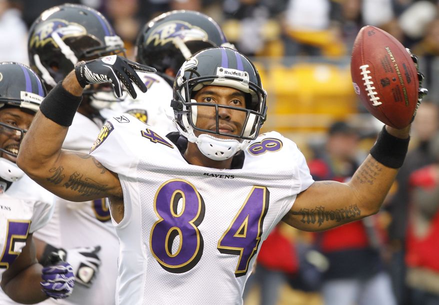 ASSOCIATED PRESS Baltimore Ravens wide receiver T.J. Houshmandzadeh (84) celebrates making a touchdown catch with less than a minute to go in the NFL football game, giving the Ravens the lead over the Pittsburgh Steelers in Pittsburgh, Sunday, Oct. 3, 2010. The Ravens won 17-14. 