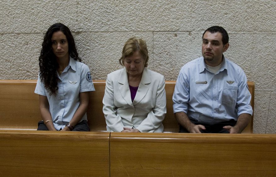 Irish Nobel peace laureate Mairead Corrigan Maguire (center) appears at the Israeli Supreme Court in Jerusalem, Monday Oct. 4, 2010, a day before she was deported. Ms. Maguire is under a 10-year ban from entering Israel because of her attempt to breach the Gaza naval blockade aboard a vessel in June. (AP Photo/Bernat Armangue)