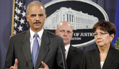 Attorney General Eric H. Holder Jr. (left), accompanied by U.S. Attorney Rosa Emilia Rodriguez-Velez (right) of the District of Puerto Rico and FBI Executive Director Shawn Henry, answers questions during a news conference at the Justice Department in Washington on Wednesday, Oct. 6, 2010. Earlier in the day, FBI agents arrested scores of Puerto Rican police officers for allegedly aiding drug dealers. (AP Photo/Haraz N. Ghanbari)
