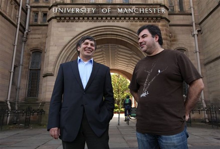Professor Andre Geim, left, and Dr Konstantin Novoselov who have have been awarded the Nobel Prize for Physics are seen outside Manchester University, Manchester, England, Tuesday, Oct, 5, 2010. The scientists shared the Nobel Prize in physics on Tuesday for "groundbreaking experiments" with the thinnest, strongest material known to mankind a carbon vital for the creation of faster computers and transparent touch screens. (AP Photo/Jon Super).