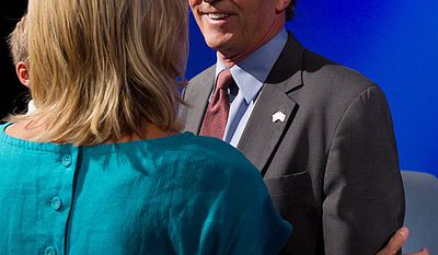 Maryland gubernatorial candidate former Republican Gov. Robert Ehrlich talks with his wife Kendel, left, after taking part in a debate against Democratic incumbent Gov. Martin O&#39;Malley, Monday, Oct. 11, 2010, in Baltimore. (AP Photo/Rob Carr)