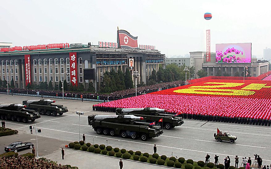 In this photo released by China's Xinhua news agency, North Korean missiles on the trucks make its way during a massive military parade to mark the 65th anniversary of the communist nation's ruling Workers' Party in Pyongyang, North Korea on Sunday, Oct. 10, 2010. This year's celebration comes less than two weeks after Kim Jong Il's re-election to the party's top post and the news that his 20-something son would succeed his father and grandfather as leader. (AP Photo/Xinhua, Yao Dawei)