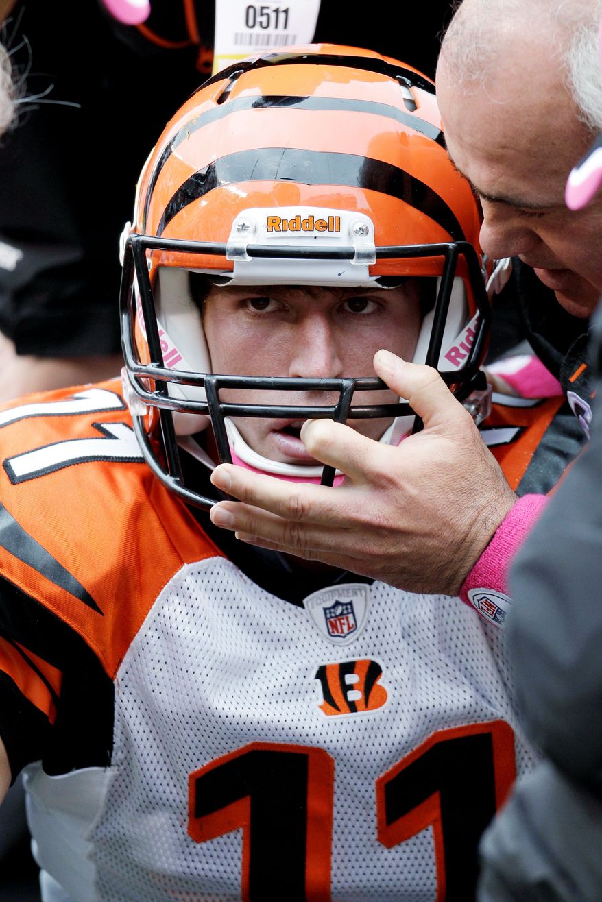Shipley is checked by medical personnel after the hit. He had a concussion. (Associated Press)