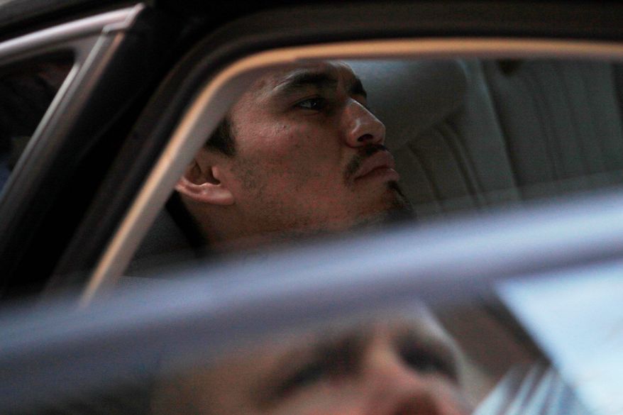 Ingmar Guandique, who is accused of killing Chandra Levy, is seen being taken by police from the Violent Crimes Unit in D.C. on April 22, 2009. (Associated Press) **FILE**