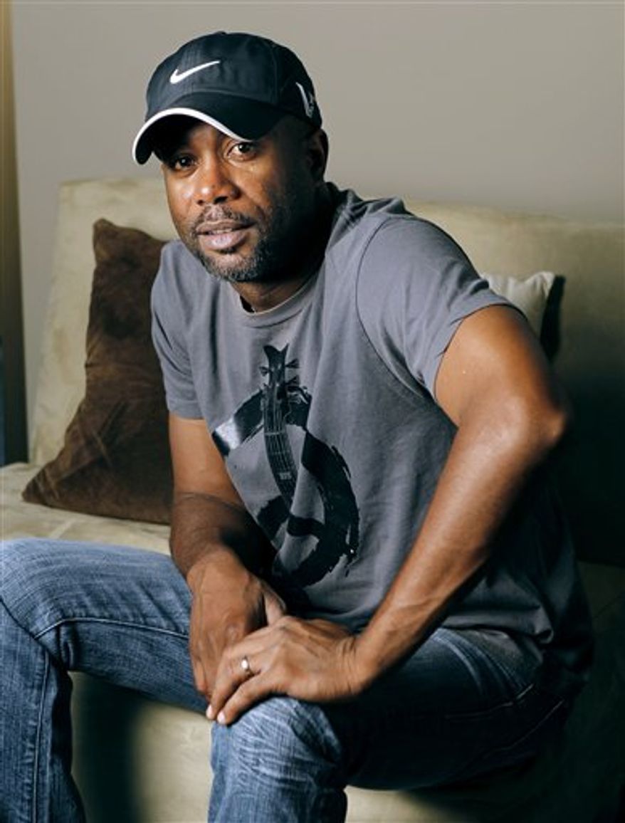 This Oct. 13, 2010 photo shows Darius Rucker in Nashville, Tenn. Rucker has spent the last few years reinventing himself as a country star. He's had a platinum debut, No. 1 hits and his follow-up, "Charleston, SC 1966," debuted this week with high expectations, The Associated Press reports Thursday, Oct. 14, 2010. (AP Photo/Mark Humphrey)