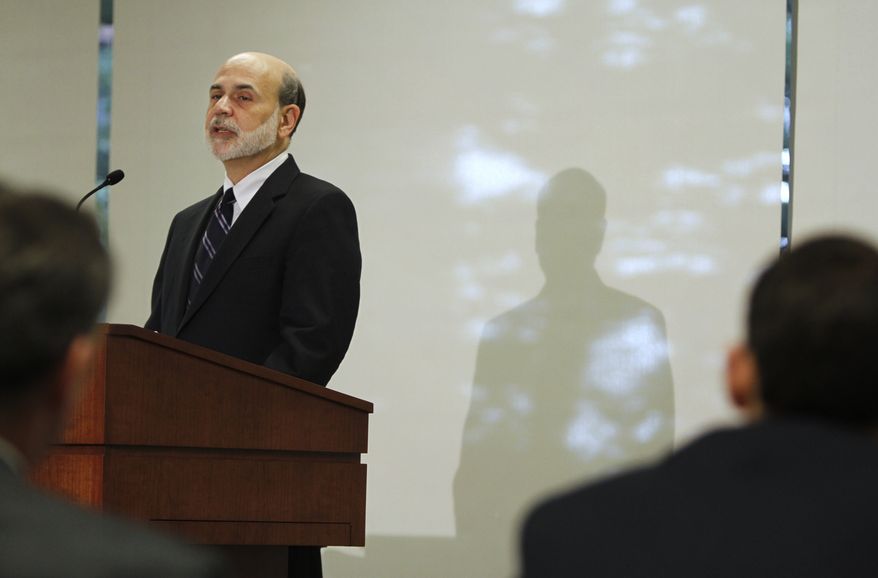 Federal Reserve Chairman Ben Bernanke addresses a Federal Reserve conference, in Boston, Friday, Oct. 15, 2010. The Federal Reserve is prepared to take further steps to rejuvenate the economy by buying Treasury bonds but is wrestling with how big the program should be, Bernanke said Friday. (AP Photo/Steven Senne)