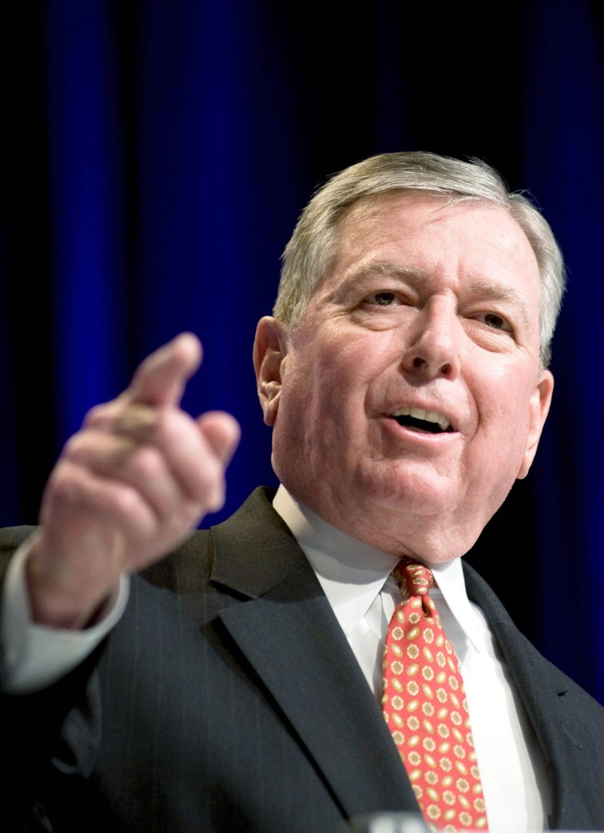 Former Attorney General John Ashcroft argues he should be shielded from lawsuits concerning his official duties. (Associated Press)