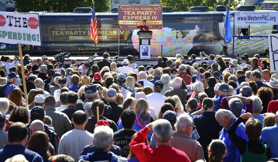 Former Alaska governor Sarah Palin speaks to the crowd during the kickoff of the nationwide Tea Party Express bus tour in Reno, Nev., Monday, Oct. 18, 2010. (AP Photo/Scott Sady)