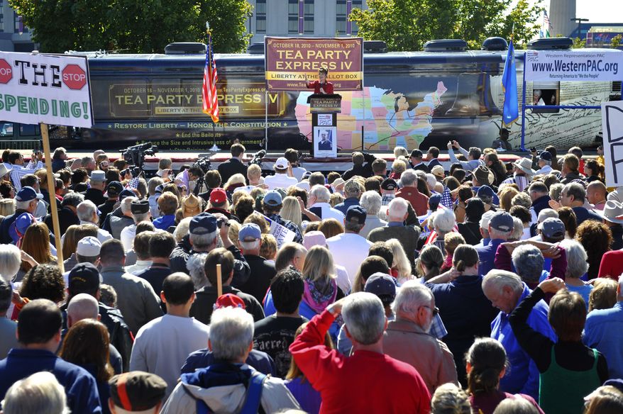 Former Alaska governor Sarah Palin speaks to the crowd during the kickoff of the nationwide Tea Party Express bus tour in Reno, Nev., Monday, Oct. 18, 2010. (AP Photo/Scott Sady)