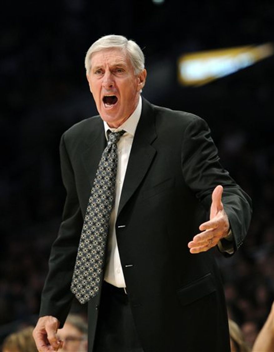Utah Jazz coach Jerry Sloan yells at a referee during the first half of a preseason NBA basketball game against the Los Angeles Lakers, Sunday, Oct. 17, 2010, in Los Angeles. (AP Photo/Mark J. Terrill)