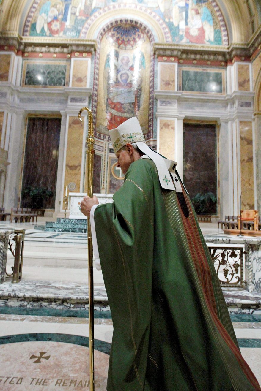 Archbishop Donald Wuerl celebrates Mass at the Cathedral of Saint Matthew in Washington on Wednesday. (Associated Press)