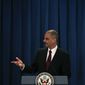 U.S. Attorney General Eric H. Holder Jr. speaks during a press conference at the U.S. Embassy in Beijing, China, Thursday, Oct. 21, 2010. (AP Photo/Alexander F. Yuan)