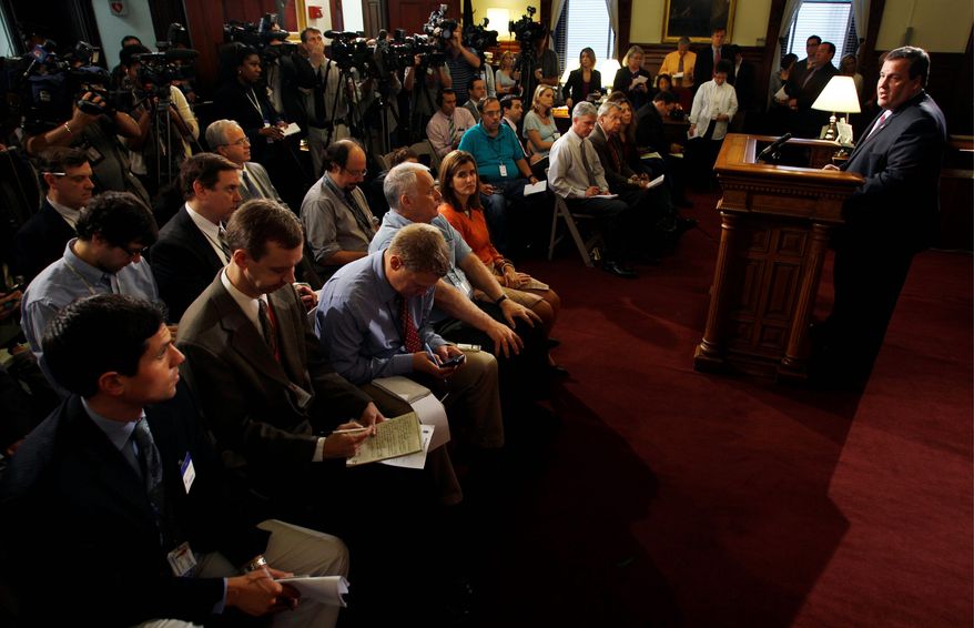 New Jersey Gov. Chris Christie announces on Wednesday in Trenton, N.J., that he's standing by his decision to kill the nation's biggest public works project, a train tunnel connecting New Jersey to New York City. Mr. Christie, a rising star in the Republican Party for his fearless budget-slashing, has argued that his cash-strapped state can't afford to pay for any overruns on the $9-billion-plus rail tunnel under the Hudson River. The state is on the hook for $2.7 billion in overruns. (Associated Press)