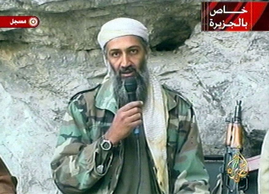 This image made from video broadcast on Sunday, Oct. 7, 2001, shows Osama bin Laden at an undisclosed location. The al Qaeda leader, in a new audio tape posted on Al Jazeera's website Wednesday, Oct. 27, 2010, threatened to kill French citizens to avenge their country's support for the U.S.-led war in Afghanistan and a new law that will ban face-covering Muslim veils. (AP Photo/Al-Jazeera, File)