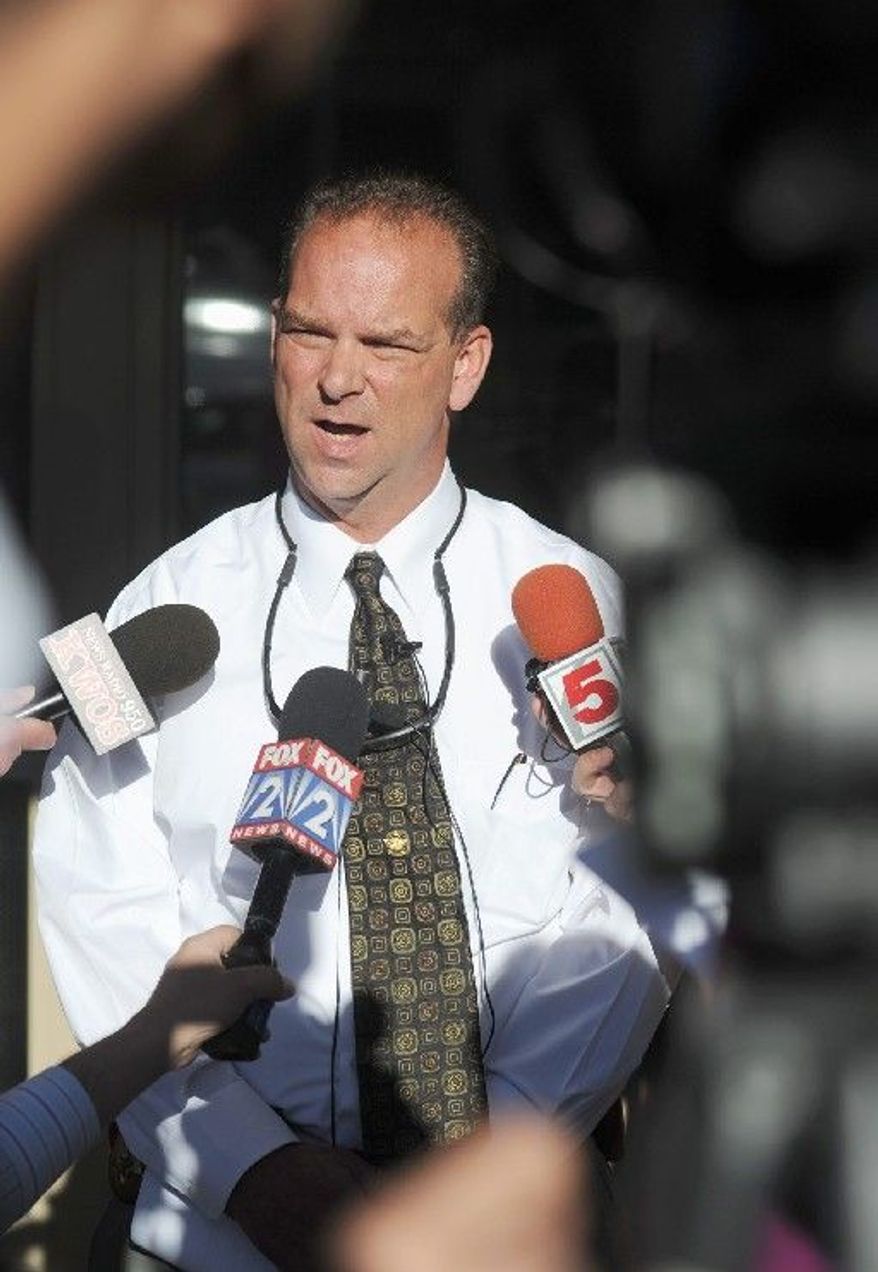 Sgt. Robert Bruchsaler of the Mid-Missouri Major Case Squad speaks outside the Callaway County Sheriff's Department in Fulton. Three people are dead and another is wounded after shootings in the county. (Associated Press)