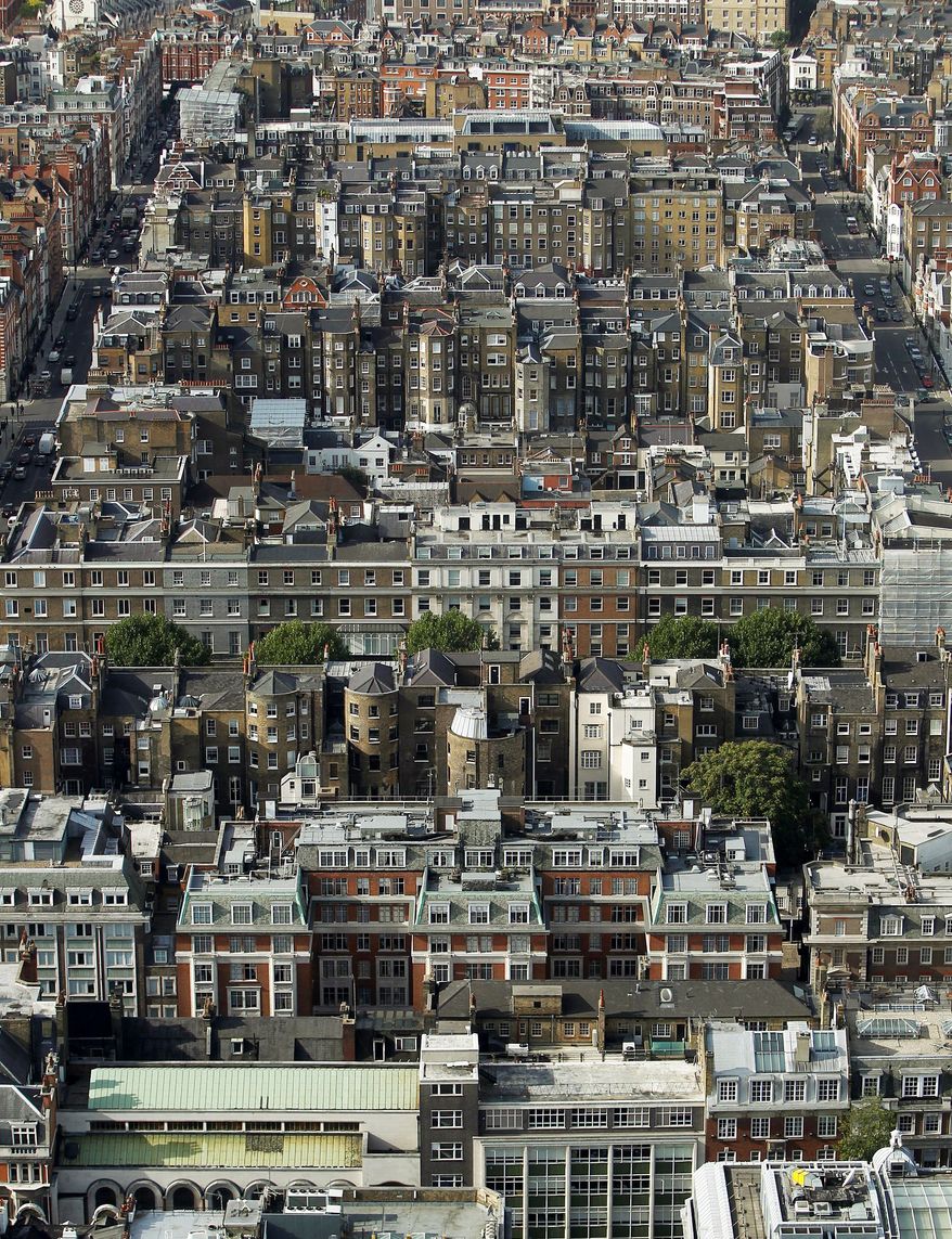 The view of central London from atop the BT Tower shows the famed ethnic, economic and cultural mix of the city, where swank mansions sit in the shadows of grim tower blocks and residents from all walks of life mingle in shops, schools and subway stations. (Associated Press)