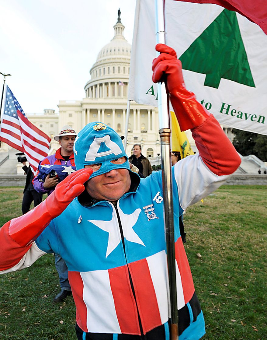Tea Party Patriot, and Captain America, Jim Griffen, of Fort Washington, Md., takes part in an election day demonstration on the lawn of the Capitol in Washington, Tuesday, Nov. 2, 2010. (AP Photo/Cliff Owen)