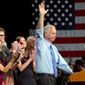 Wisconsin Republican Ron Johnson, a political novice, celebrates his victory over veteran Democratic Sen. Russ Feingold Tuesday night in Oshkosh, Wis., with family and supporters. (Associated Press)
