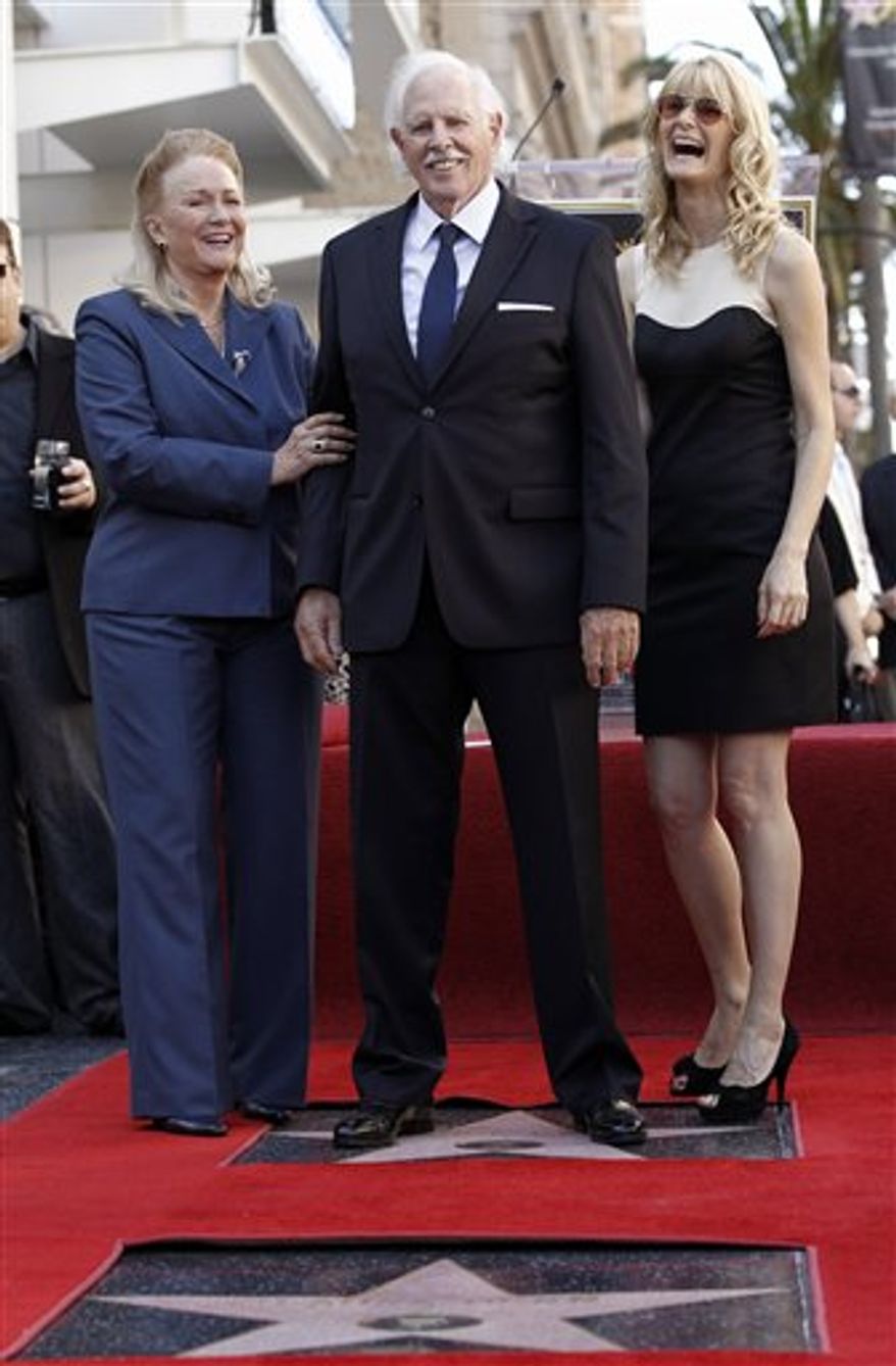 Actress Diane Ladd, left, actor Bruce Dern, and actress Laura Dern pose after all received stars on the Hollywood Walk of Fame in Los Angeles, Monday, Nov. 1, 2010. (AP Photo/Matt Sayles)