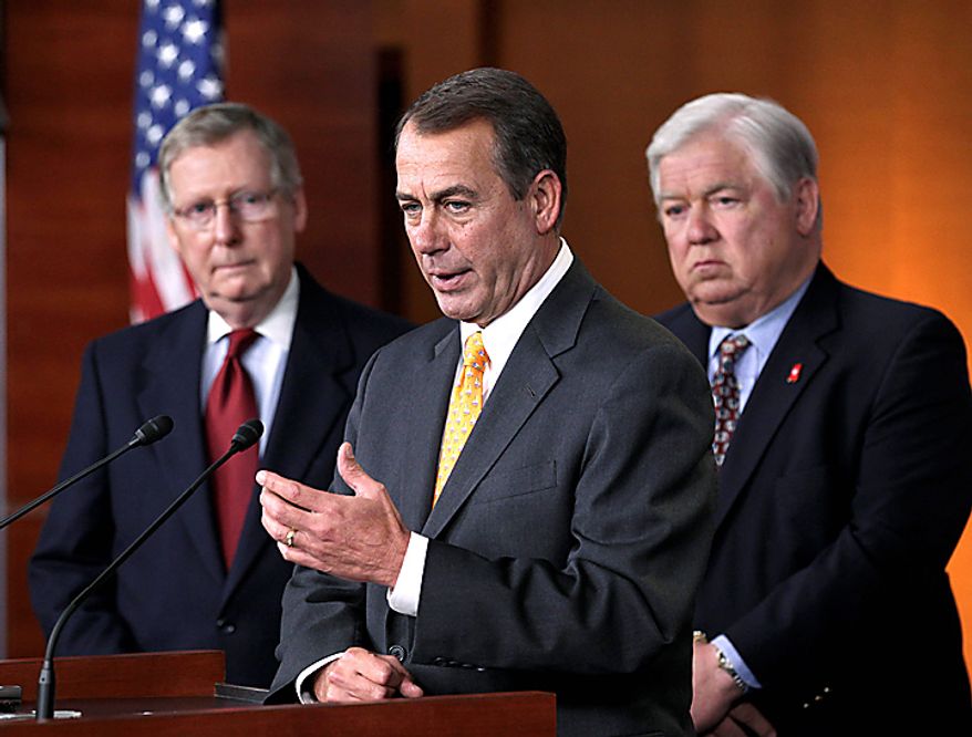 House Republican leader John Boehner of Ohio, center, accompanied by Mississippi Gov. Haley Barbour, chairman of the Republican Governors Association, right, and Senate Minority Leader Mitch McConnell of Ky. takes questions on the sweeping GOP victory in the 2010 midterm elections, during a news conference on Capitol Hill in Washington, Wednesday, Nov. 3, 2010. (AP Photo/J. Scott Applewhite)