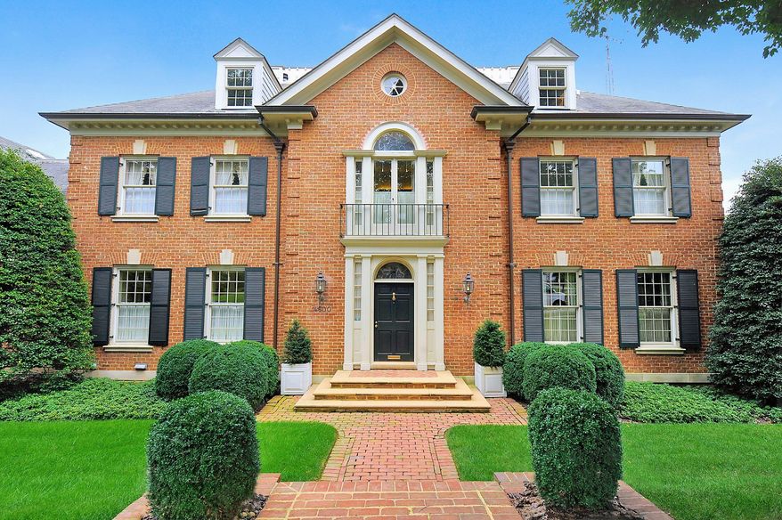The custom-designed home at 4600 Charleston Terrace NW in the District's Foxhall neighborhood is on the market for $2,725,000. The home's widow's walk offers spectacular views of downtown Washington.