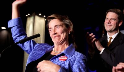 Sen. Blanche Lincoln, Arkansas Democrat, acknowledges her supporters during her concession speech on Tuesday in Little Rock, Ark., as her husband, Steve, looks on. (Associated Press)