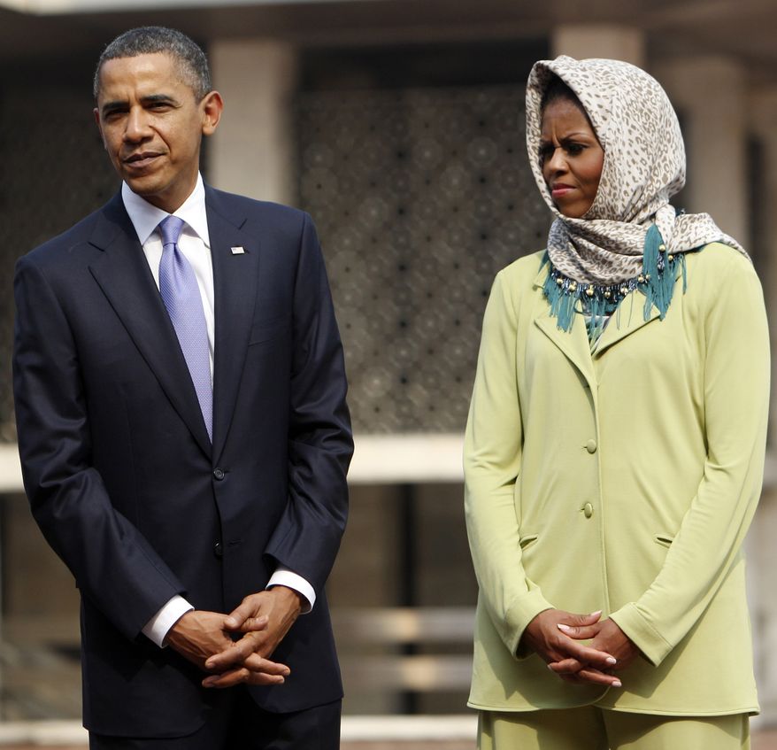 President Obama and first lady Michelle Obama visit Istiqlal Mosque in Jakarta, Indonesia, on Wednesday. (Associated Press)
