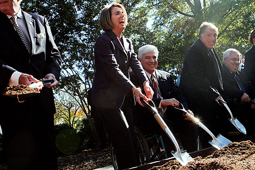 House Speaker Nancy Pelosi if Calif., center, laughs during the groundbreaking ceremony for the American Veterans Disabled for Life Memorial, Wednesday, Nov. 10, 2010, in Washington. (AP Photo/Jacquelyn Martin)